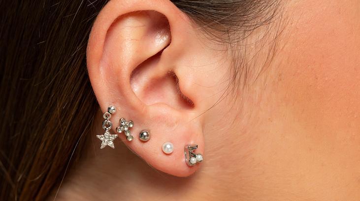enfeksiyon ve isitme kaybi riski coklu piercing tehlikesi kulak memesini bile yirtiyor NUyYpBbq.jpg